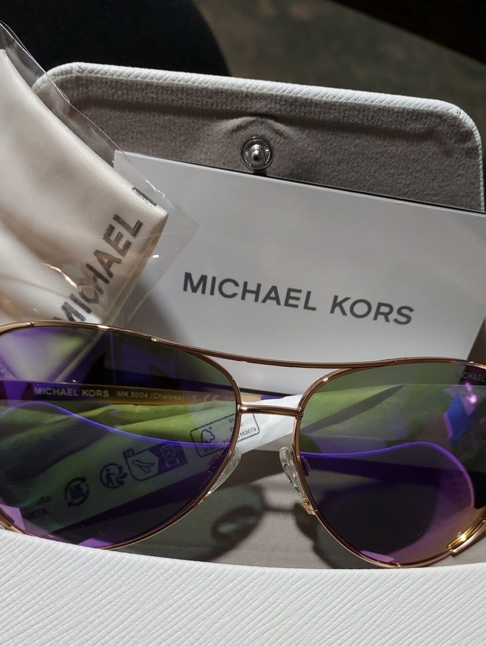Michael Kors Gold Frame Sunglasses with Iridescent Purple-Green Lenses